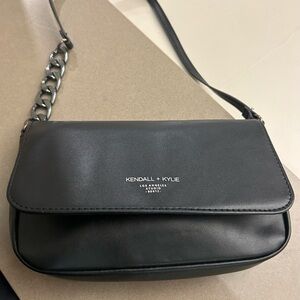 Kendall & Kylie Black Crossbody Bag with Flap Closure and Adjustable Strap